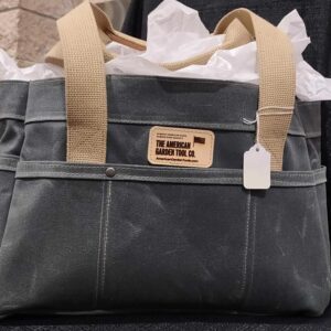 Canvas tote bag with beige handles.