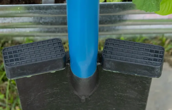 Blue bicycle floor pump with black footrests