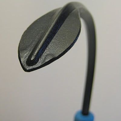 Black metal leaf on curved stem