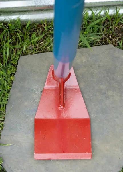 Blue pole in red metal base