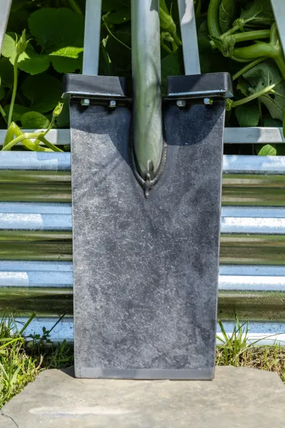 Metal fence post with rubber pad